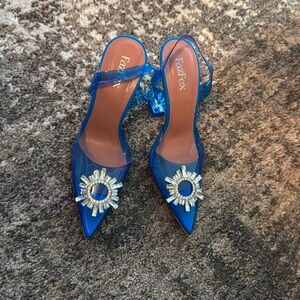 Blue clear heels with brooch rhinestones.